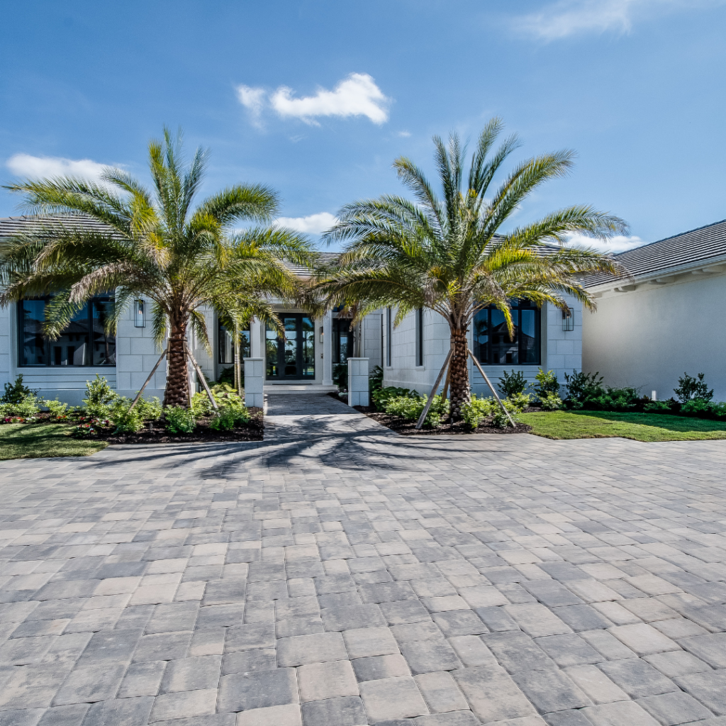 Professional landscapers maintaining a property in Orange County, FL